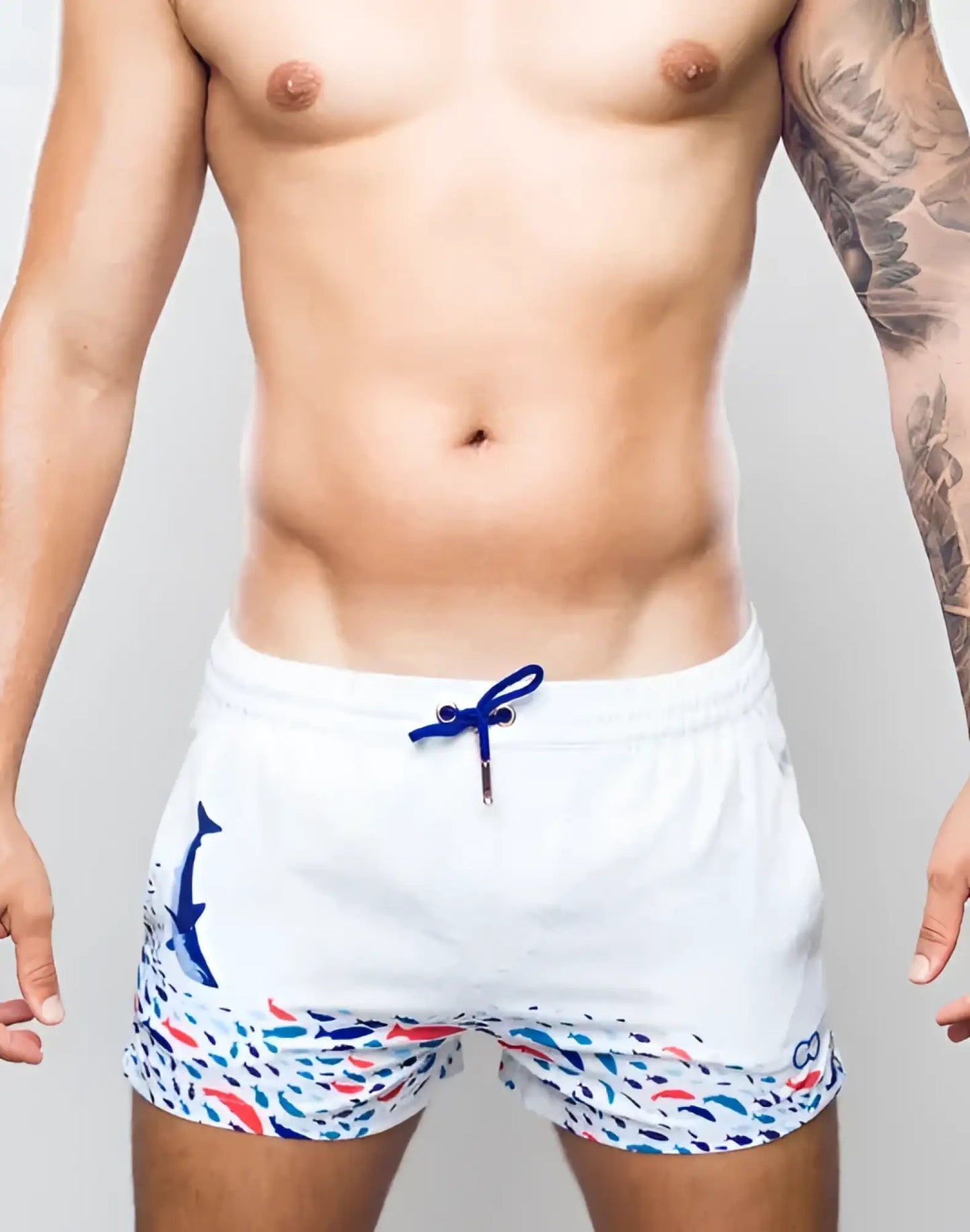 White swim trunks s50 seascape print swim short with blue whale graphic colorful fish pattern and navy drawstrings