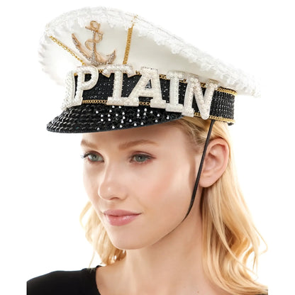 A sparkling white and black sailor captain hat with gold anchor rhinestone embellished captain lettering and sequins