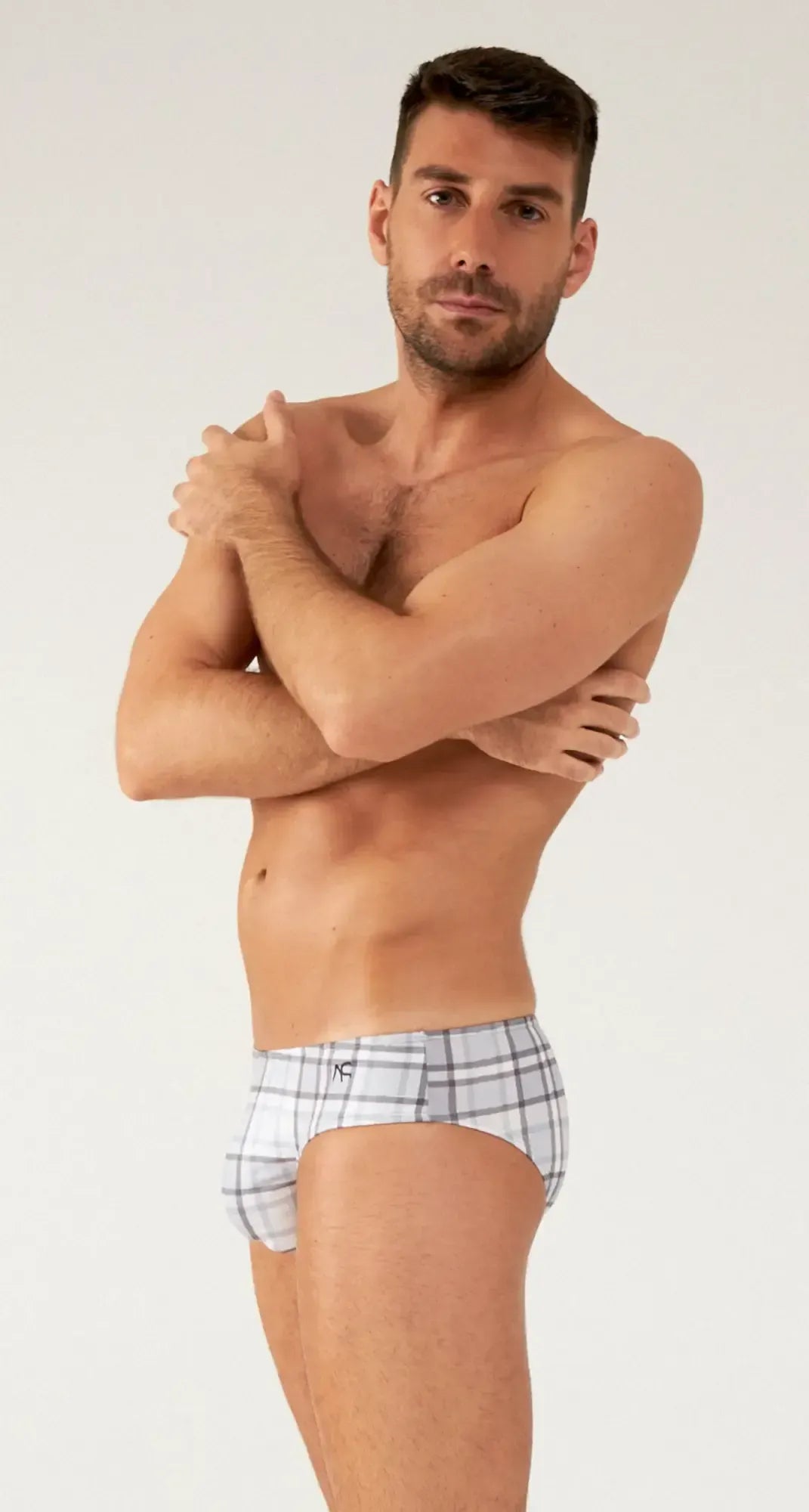 Saltire bikini plaid-patterned menâs briefs in white and gray with a comfortable fit and breathable fabric