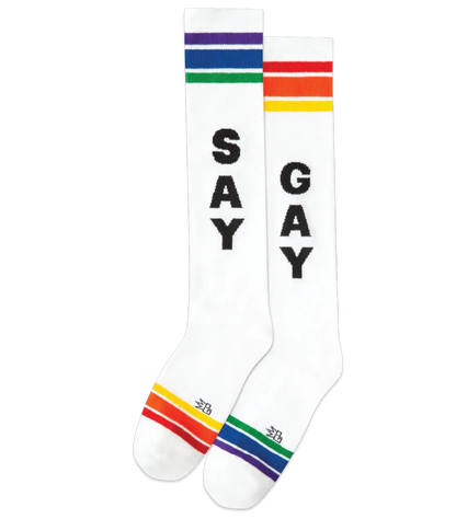 White knee high athletic socks with rainbow stripes and black say and gay print, SAY GAY knee high socks