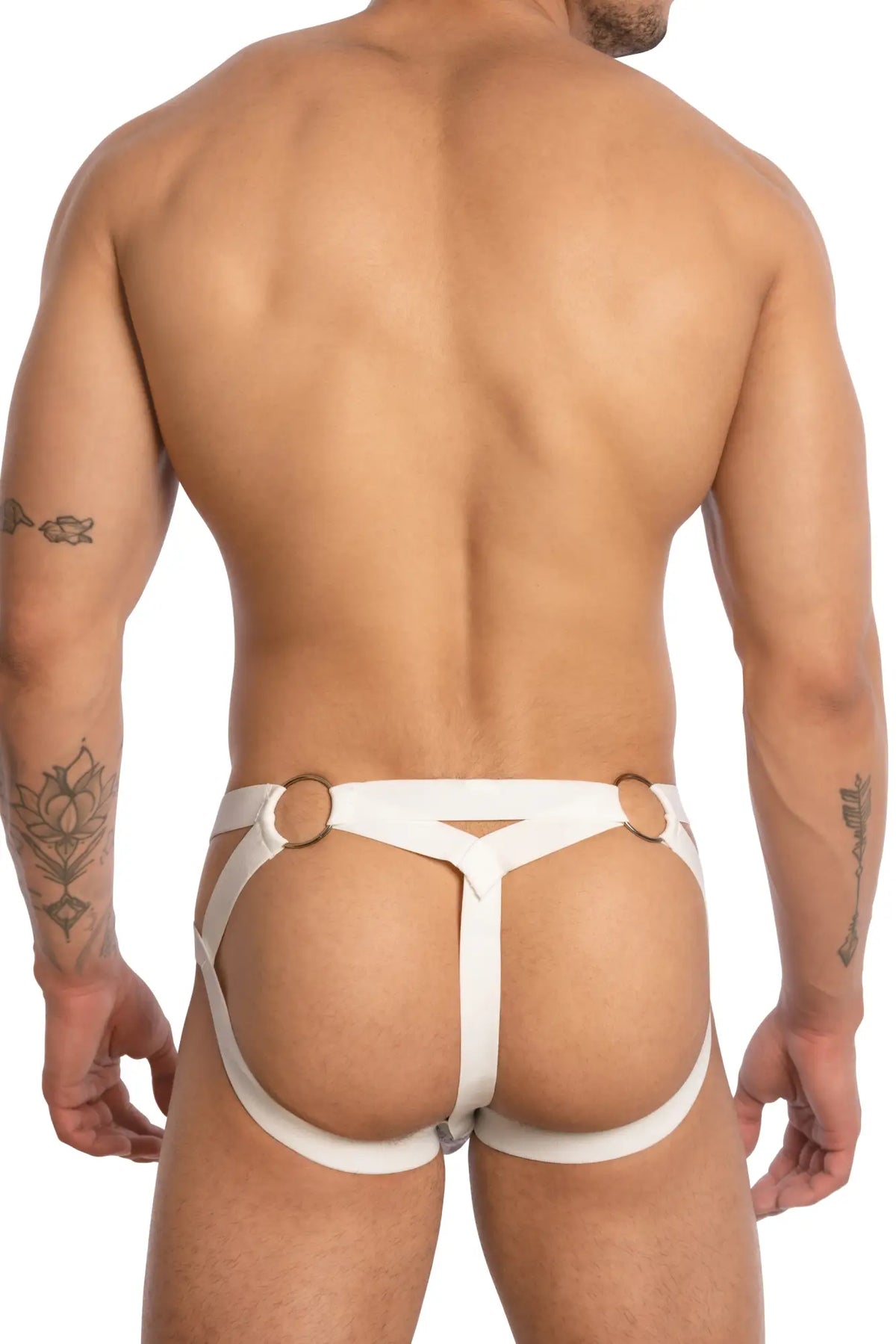 White leather harness bikini brief with gold-toned metal rings showing the back side of secret male smc0014