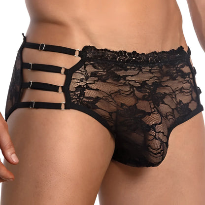 Black lace Secret Male SMI029 bikini brief with intricate floral patterns and four adjustable silver-toned metal buckles