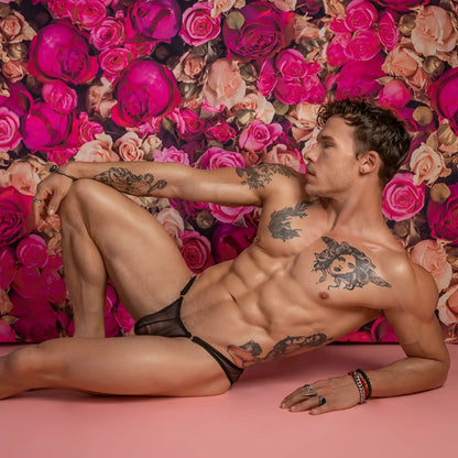 Black lace thong bikini brief with sheer delicate design from Secret Male SMI043 showing front view
