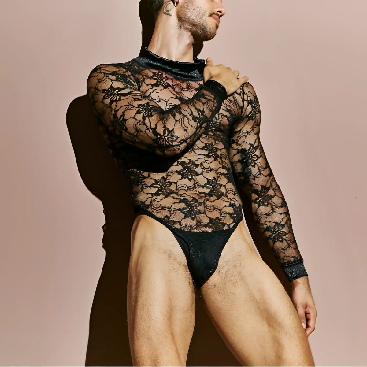 Secret Male SMV008 black lace bodysuit with long sleeves and high neckline detailed for elegant wear