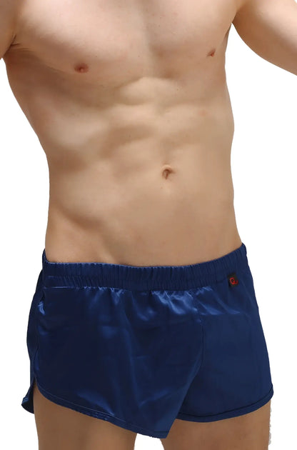Navy blue satin shorts with a red logo on the waistband featuring a built-in jockstrap for support