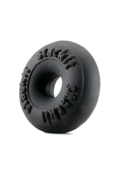 Black rubber donut-shaped kila skin stackit ring with embossed text around the circumference