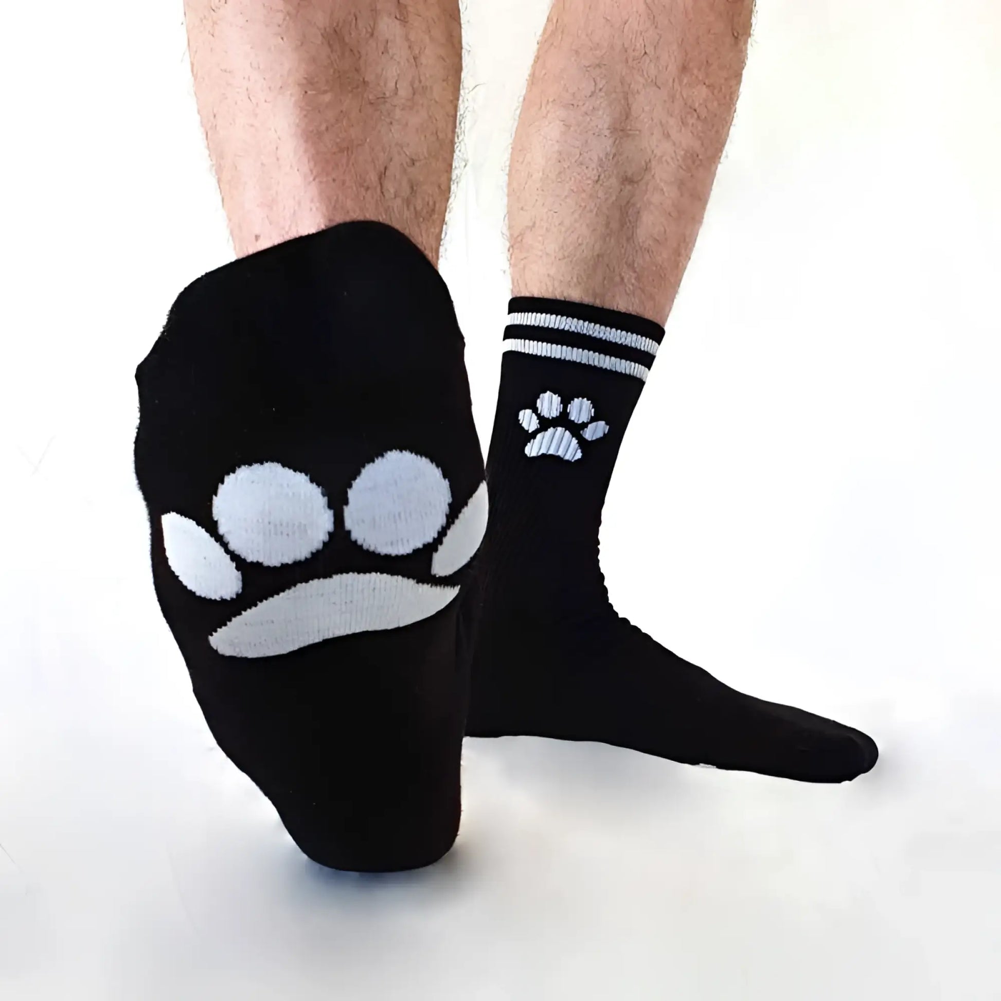Black sk8erboy puppy socks size 39-42 with white paw print designs featuring larger and smaller paws