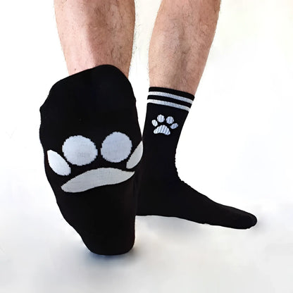 Black sk8erboy puppy socks size 39-42 with white paw print designs featuring larger and smaller paws