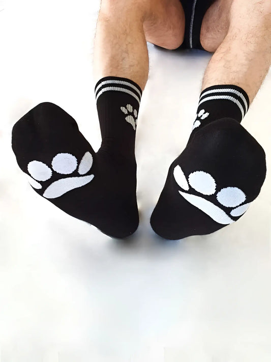 Black sk8erboy puppy socks with white paw prints on toes and striped cuffs size 39-42