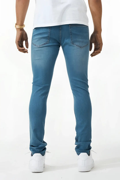 Blue skinny fit denim jeans with a slim fit and classic five-pocket design made from denim material
