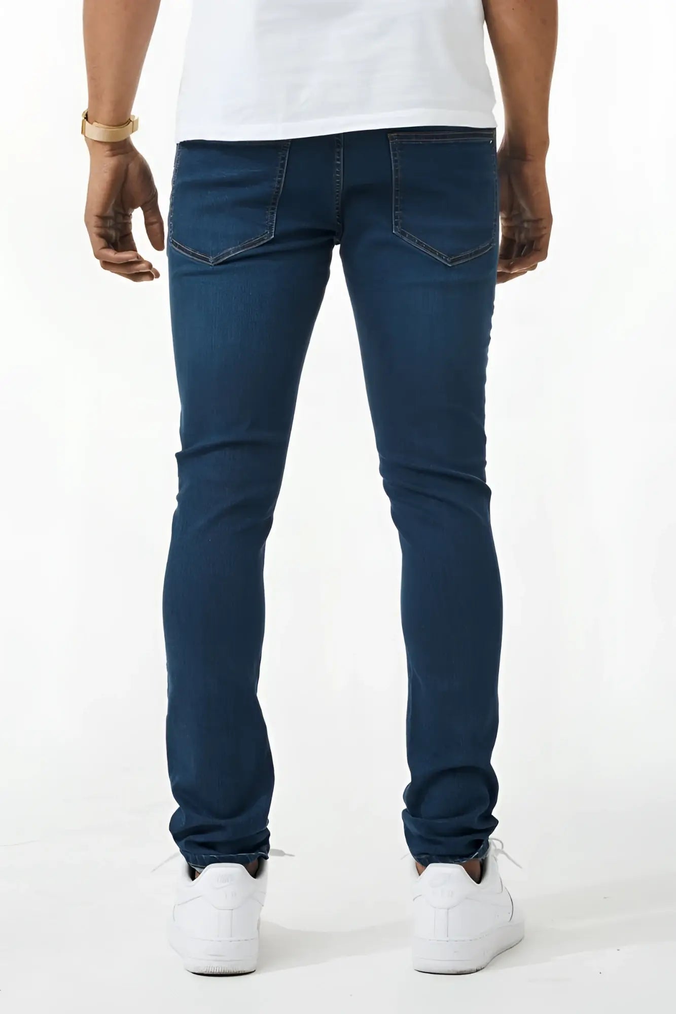 Dark blue skinny fit denim jeans with a slim fit and classic five-pocket design made from denim material