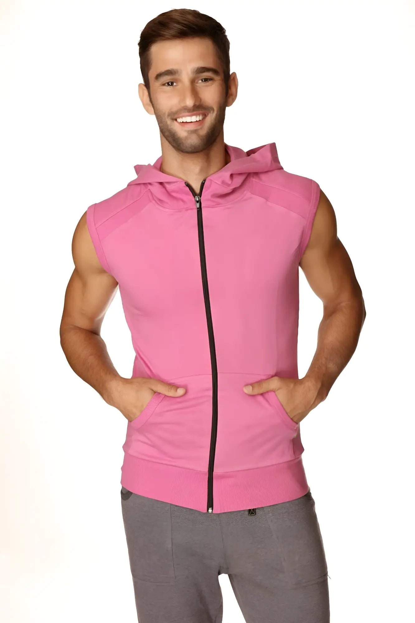 Pink sleeveless zip up yoga hoodie with hood and front pockets designed for berry workout wear