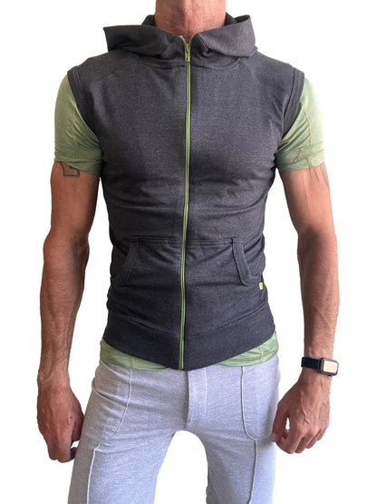 Sleeveless yoga hoodie charcoal gray in dark gray with lime green zipper and sleeve accents worn over matching shirt