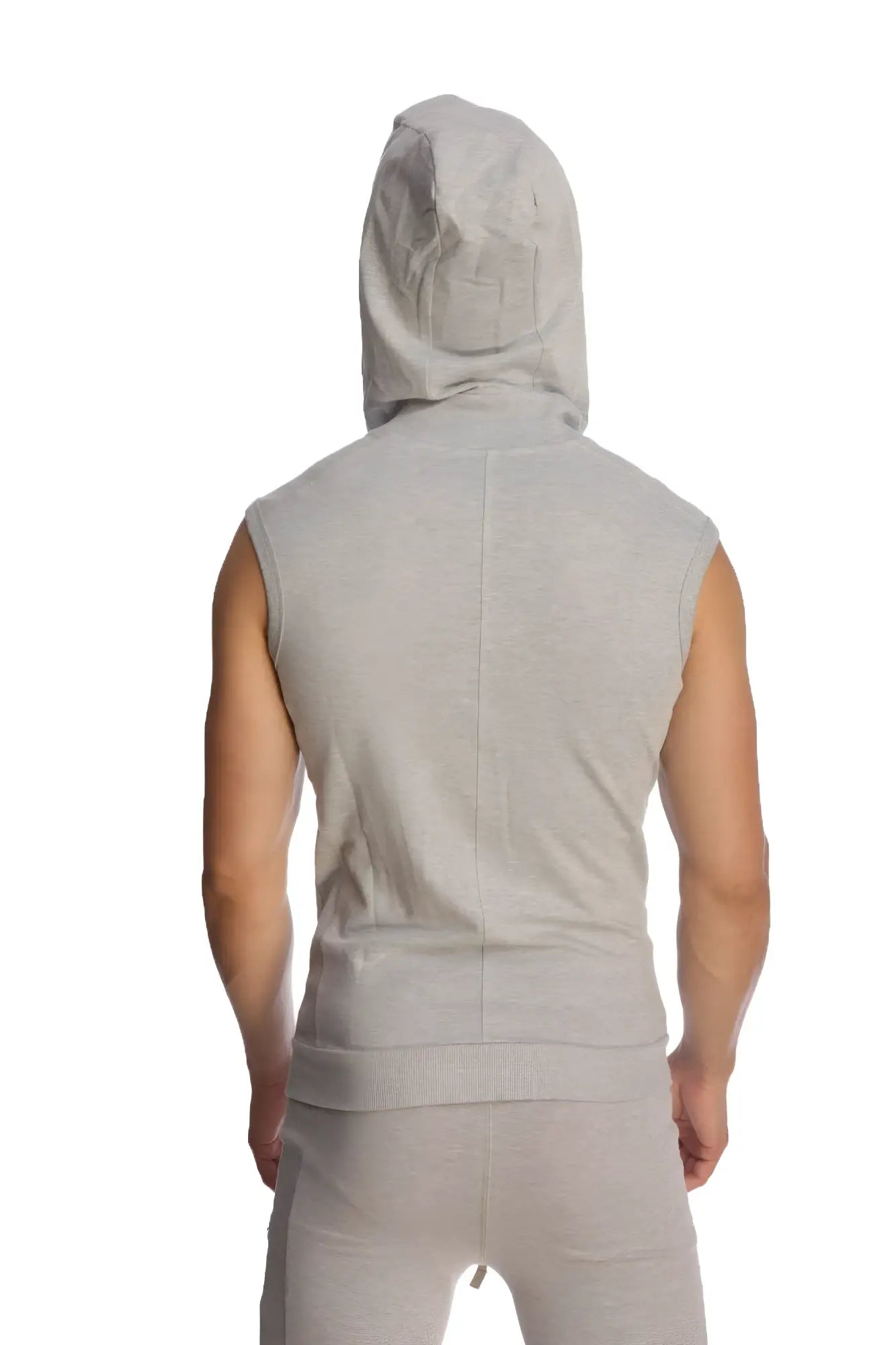 A light gray sleeveless yoga hoodie with a hood and front seam worn by a person for activewear