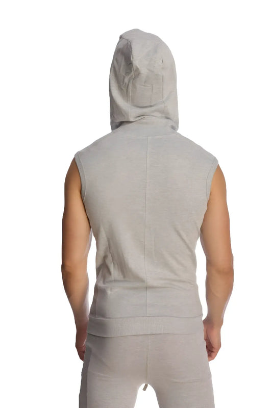A light gray sleeveless yoga hoodie with a hood and front seam worn by a person for activewear