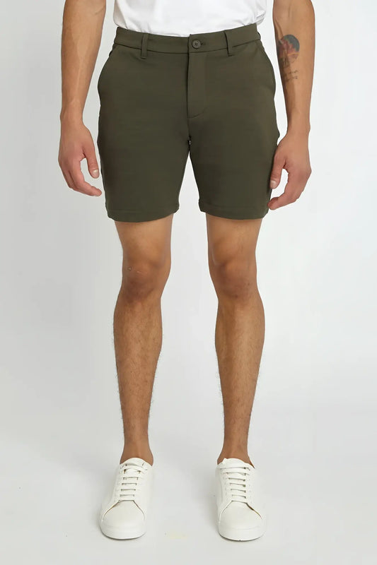 Olive green solid stretch knit chino shorts with classic fit and button closure