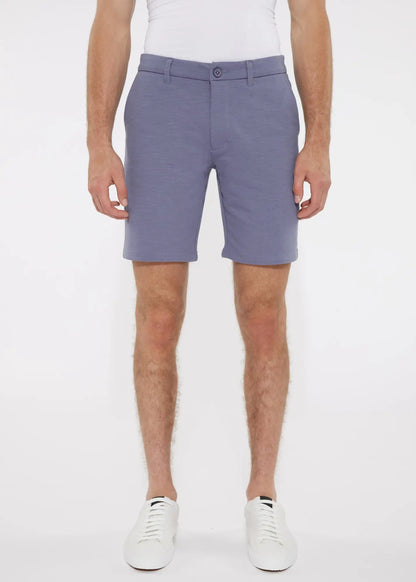 A pair of solid light blue men’s tailored shorts with stretch knit fabric belt loops and single button closure
