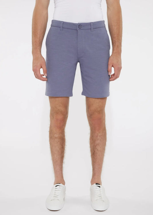 A pair of solid light blue men’s tailored shorts with stretch knit fabric belt loops and single button closure