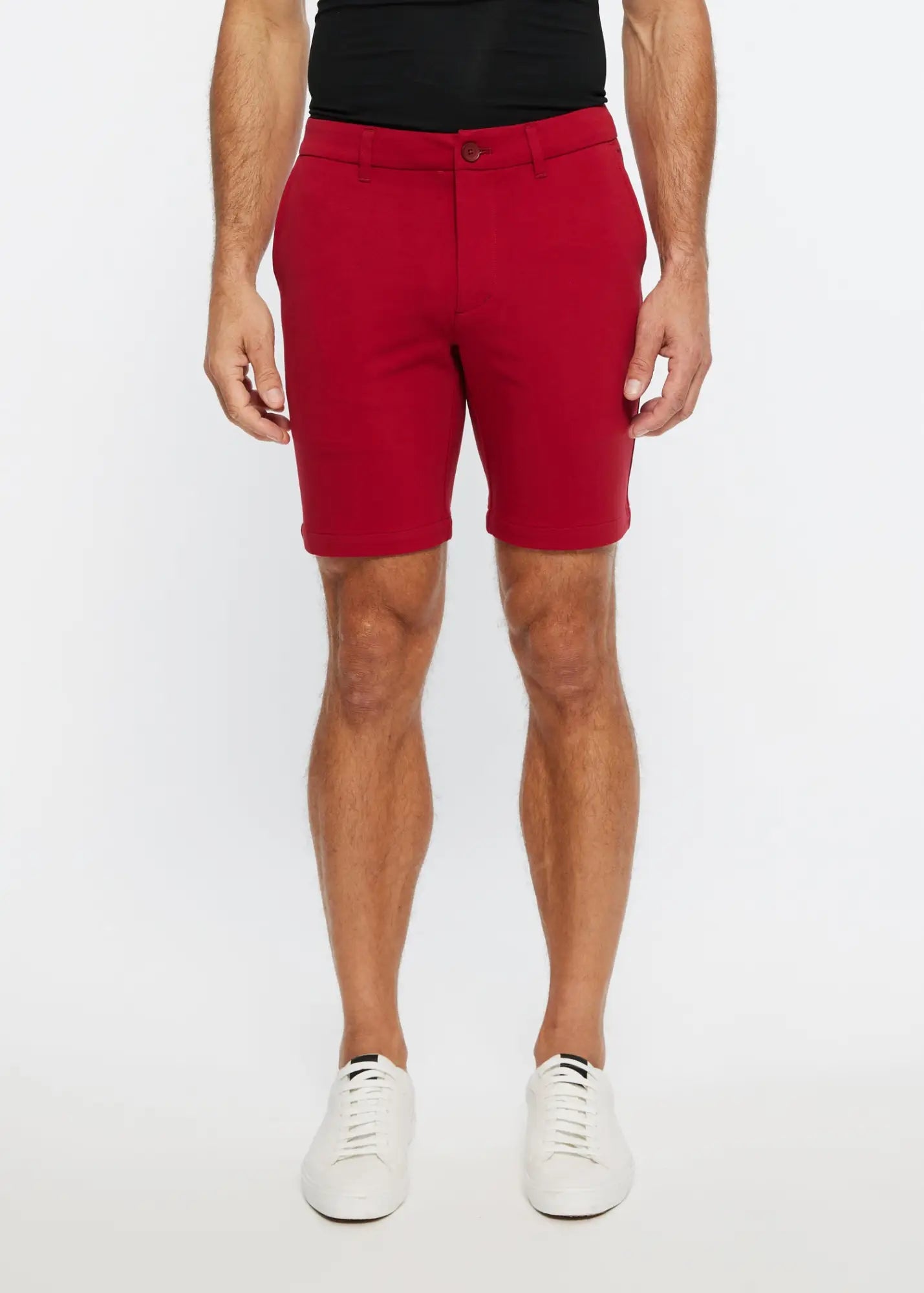 Red men’s solid stretch knit chino shorts with tailored fit and button closure for casual wear