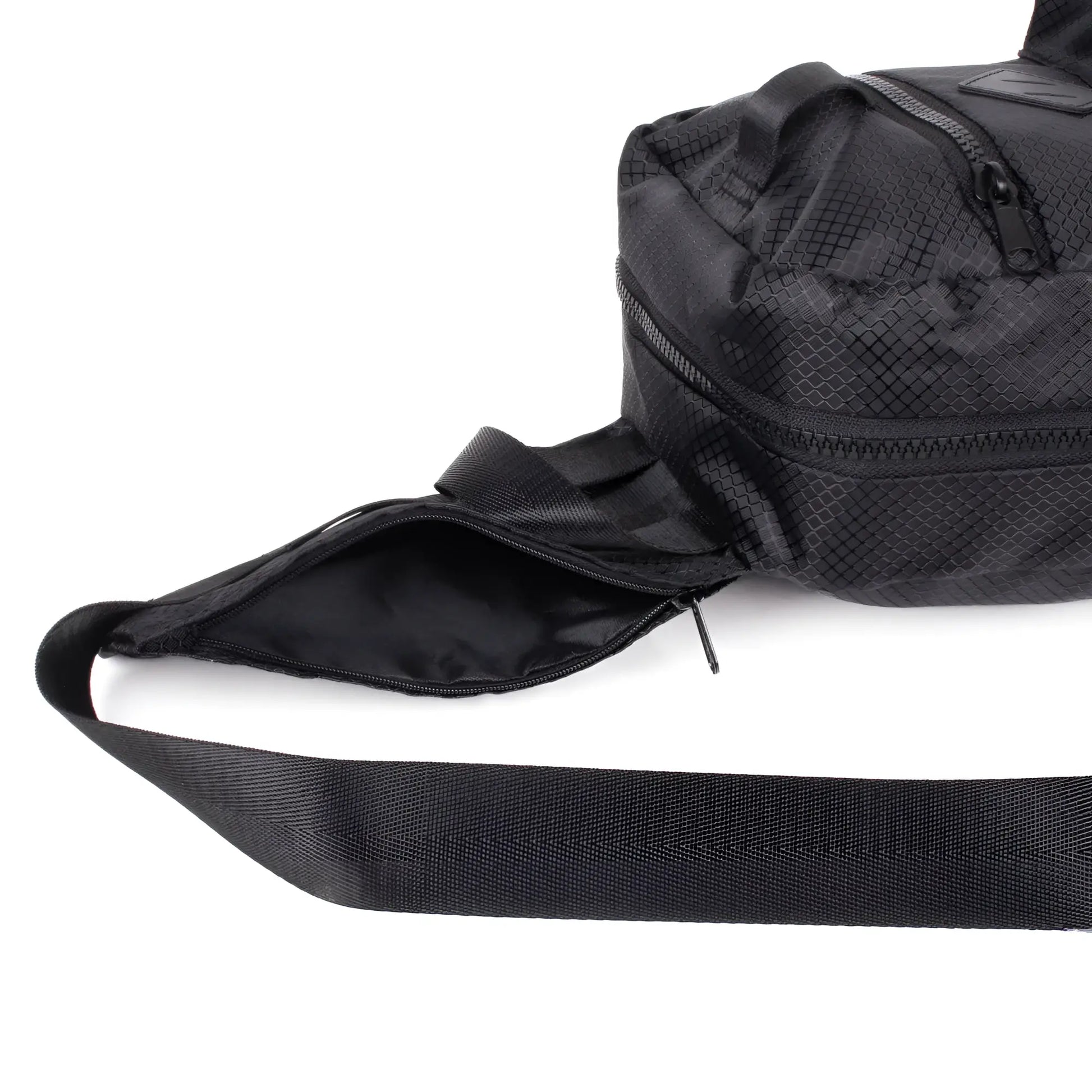 Sport crossbody sling bag in black mesh pattern with wide adjustable strap and multiple zippered compartments