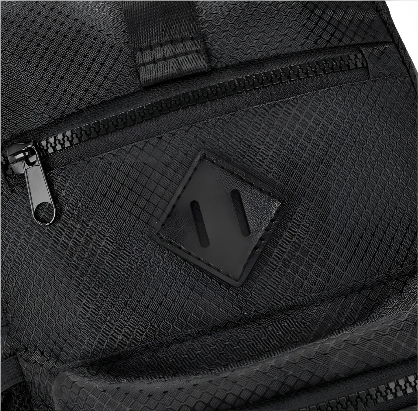 Sport crossbody sling bag in black mesh texture with diamond leather patch and black zipper details