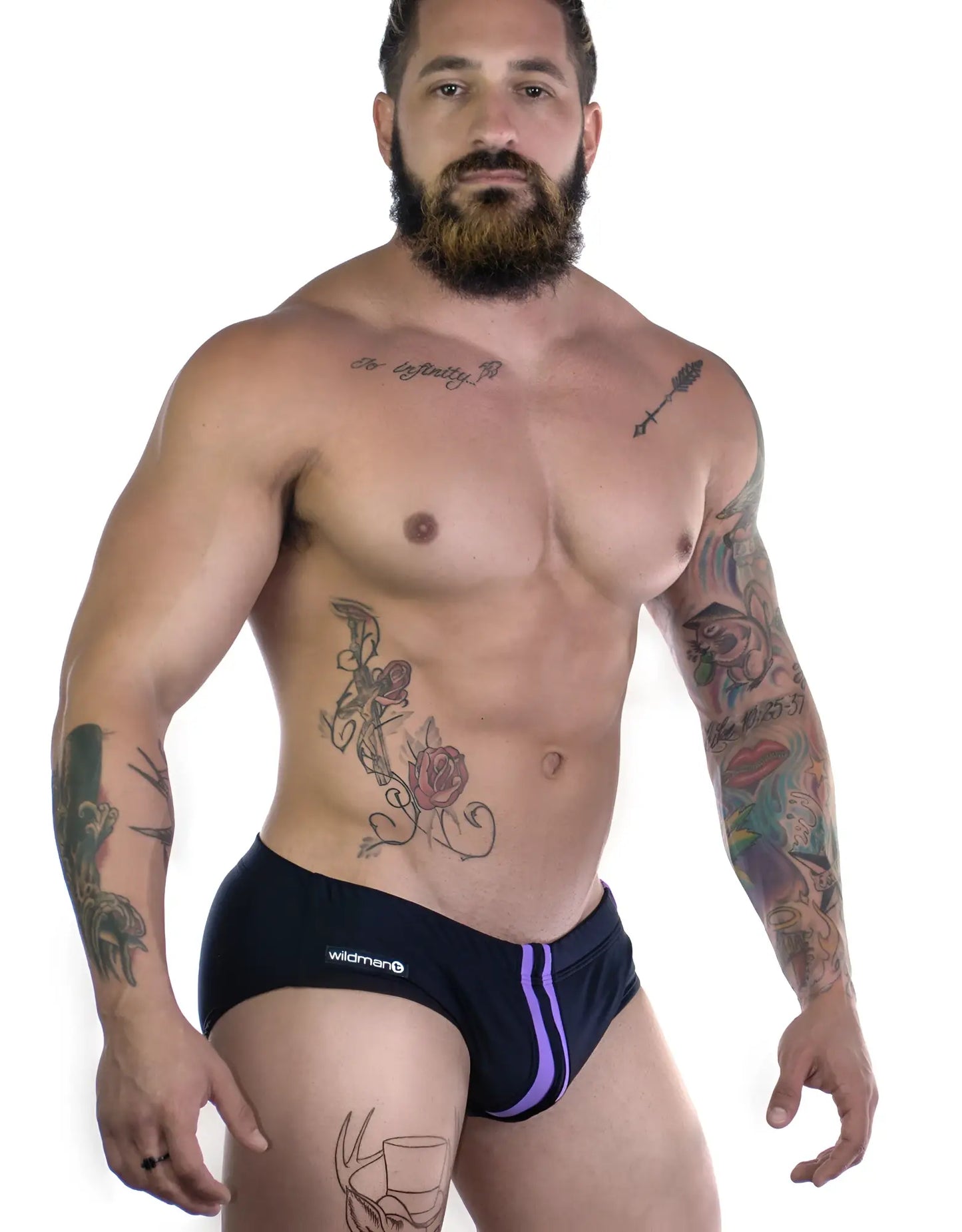 Black sportivo bikini briefs with a purple stripe and wildmen brand logo on the side for active wear