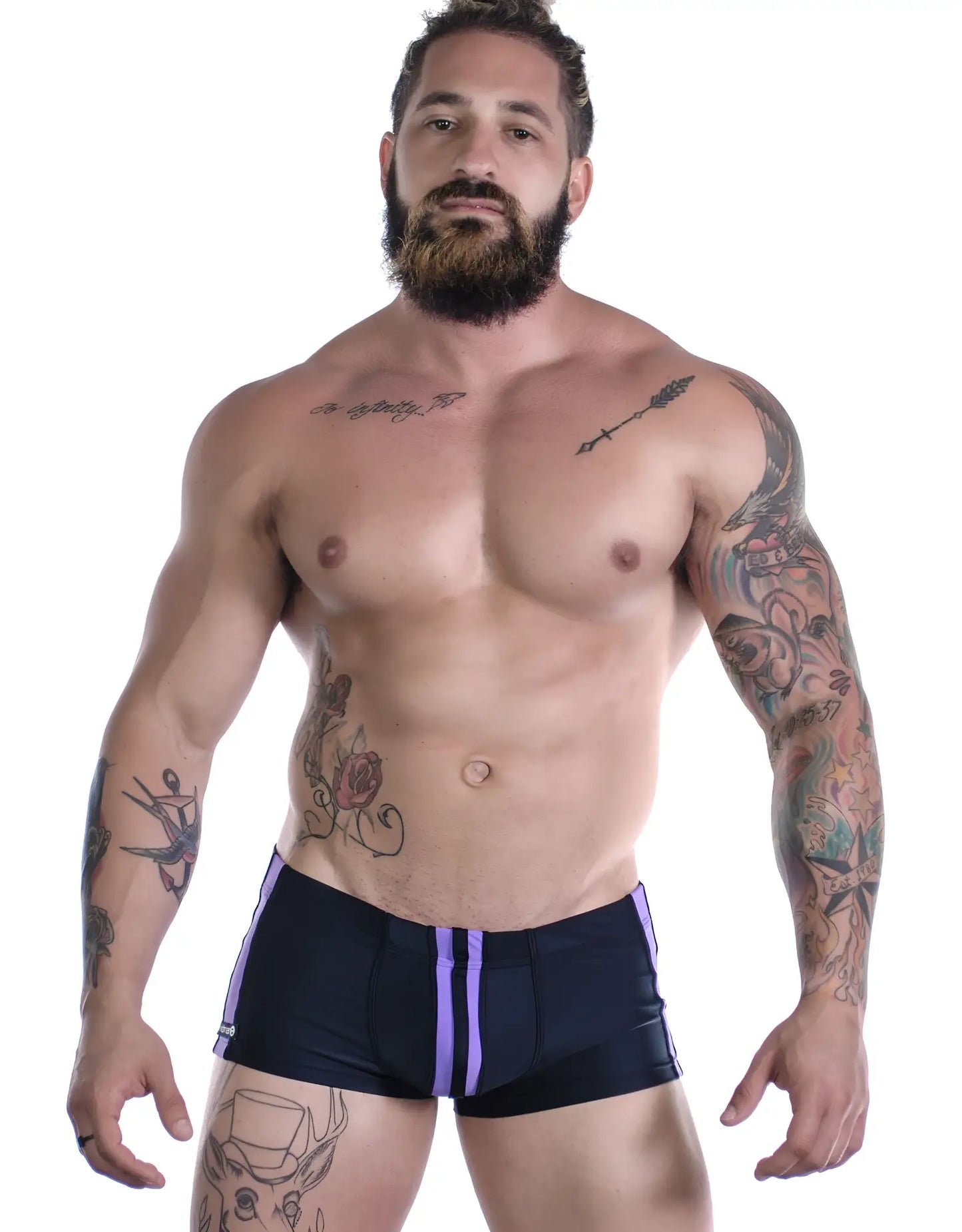 Black swim trunks with purple side stripes in sportivo square cut design for active swimwear use
