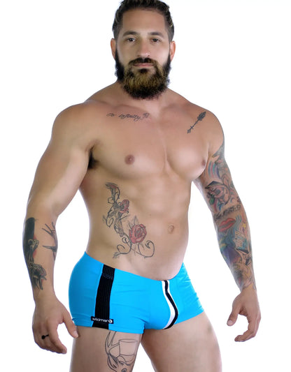 Sportivo square cut teal swim trunks in bright blue with black and white side stripes featuring wildman logo