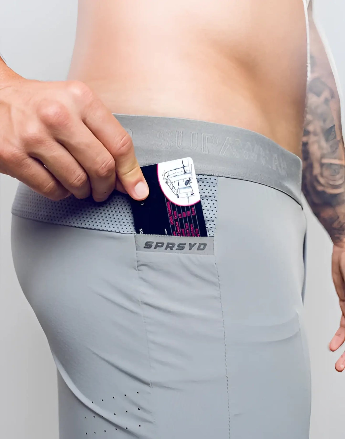 Gray spr flex short athletic briefs with mesh waistband and branded pocket for activewear use