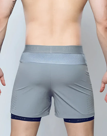 Gray spr flex athletic shorts with mesh waistband navy blue hem trim and spreyd branding for active wear