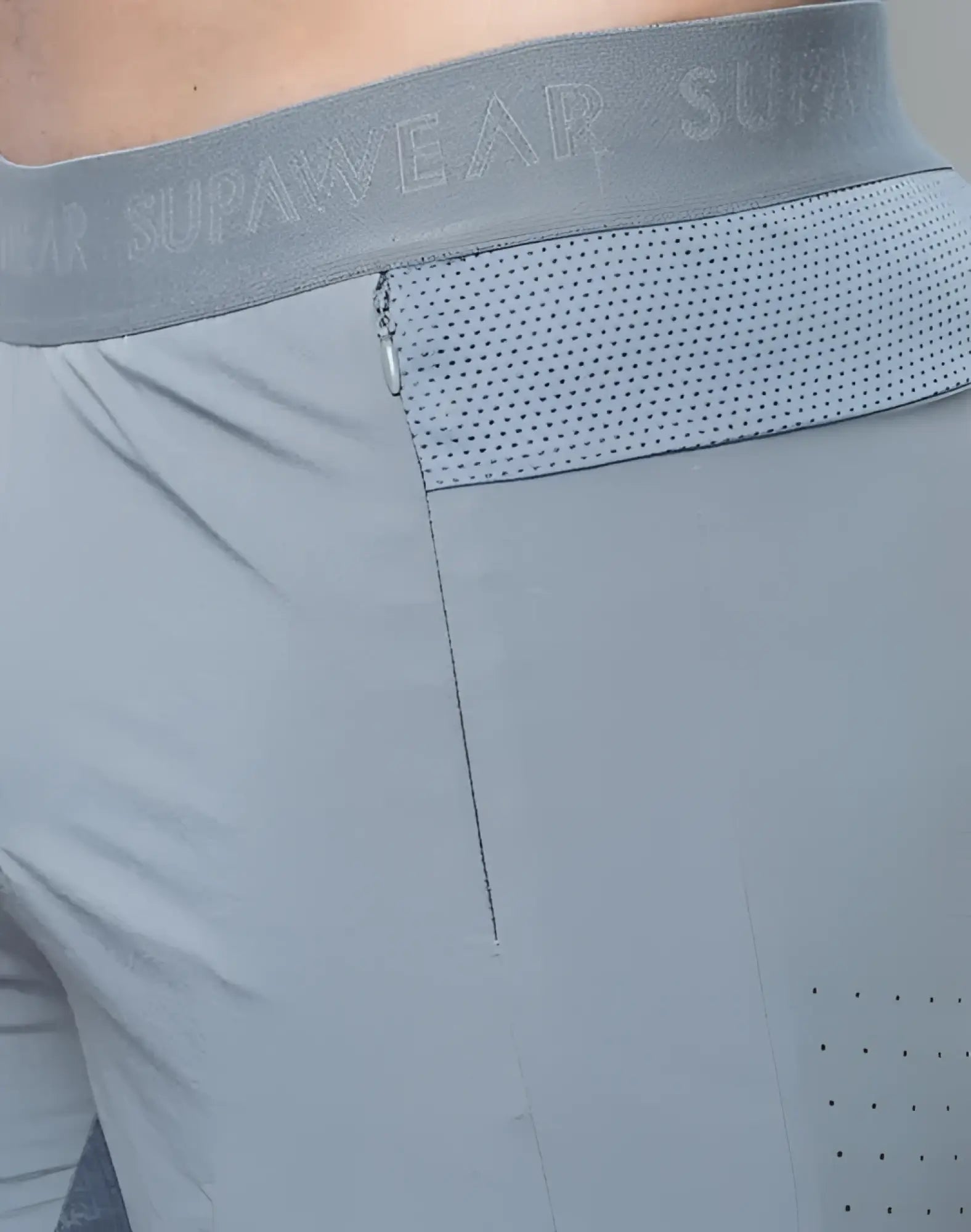 Gray spr flex athletic shorts with perforated mesh panel and elastic waistband featuring supawear logo