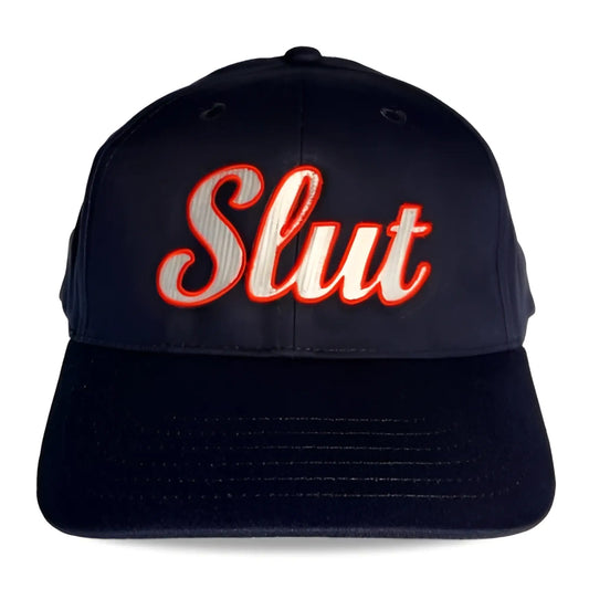 Black spunky monkee baseball cap with slut embroidered in red and white thread on the front panel