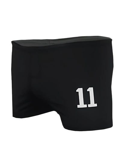 Black square trunk athletic shorts with white 11 number embroidered on front for activewear use