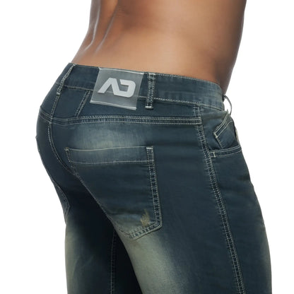 Dark wash squat bermuda jeans with sleek modern design contrasting stitching and branded patch on back waistband