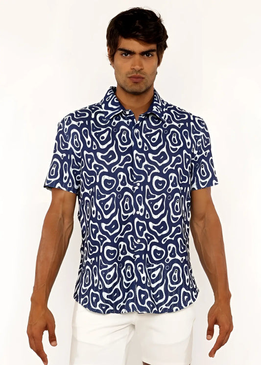 A navy blue short-sleeved squiggly print open knit shirt with a white abstract pattern in lightweight fabric