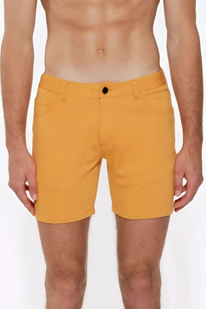 Bright yellow st33le stretch knit shorts apricot peel with black button and classic five-pocket design size 28