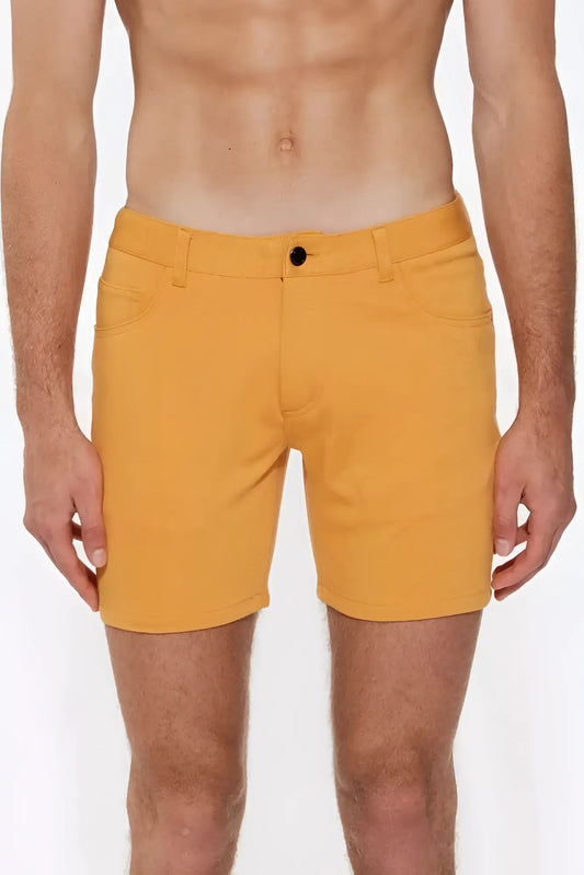Bright yellow st33le stretch knit shorts apricot peel with black button and classic five-pocket design size 28