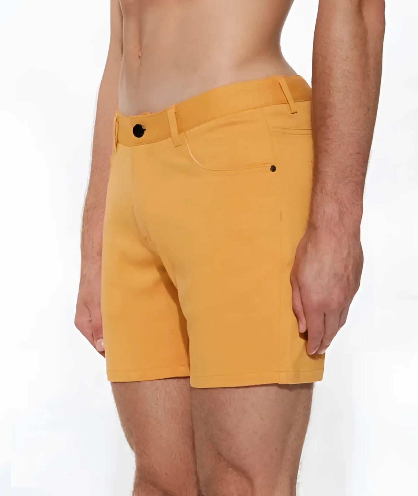 Bright yellow apricot peel st33le stretch knit shorts with sleek modern design and black button closures size 29