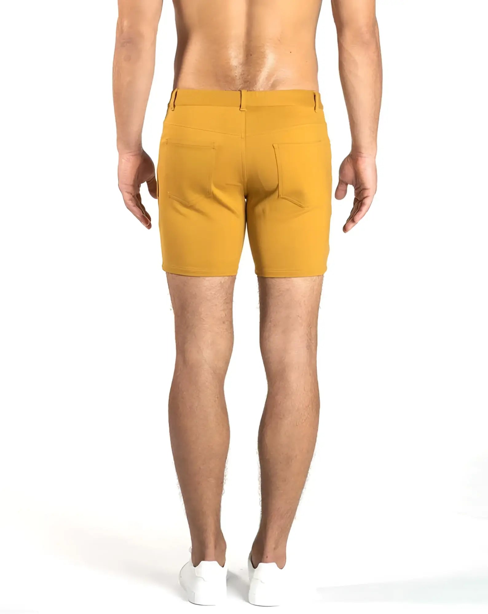 Mustard-yellow tailored fit chino shorts with stretch knit fabric and two back pockets size 29 shown from back side