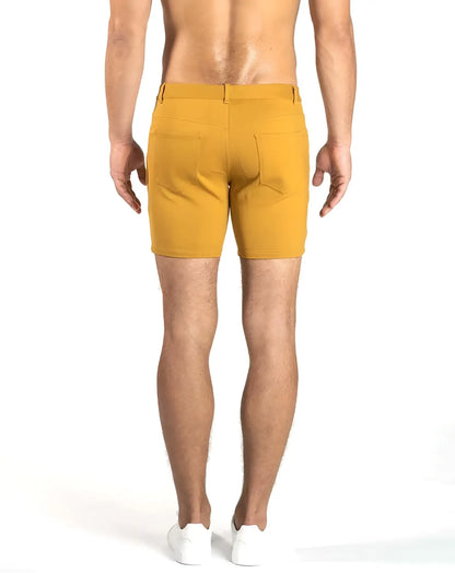 Mustard-yellow tailored fit chino shorts with stretch knit fabric and two back pockets size 29 shown from back side