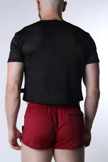 Black mesh short-sleeved crop top with subtle textured pattern from the starter mesh crop top collection