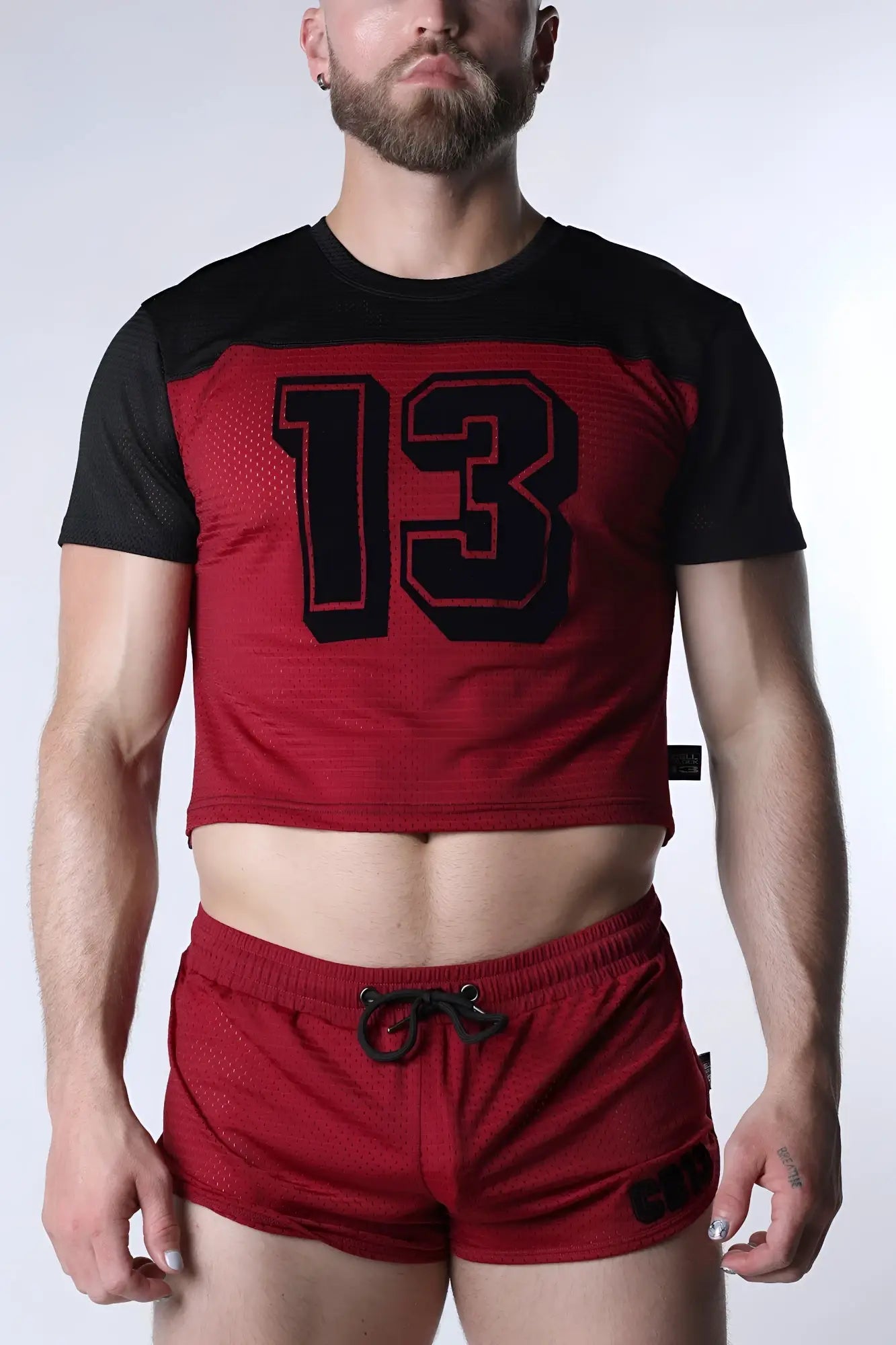 Red and black Starter mesh crop top with bold 13 graphic in breathable mesh fabric for athletic use