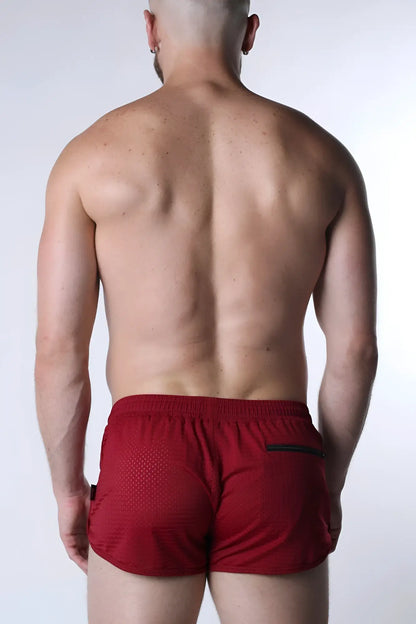 Red starter mesh short athletic shorts with mesh texture and black trim on side pockets