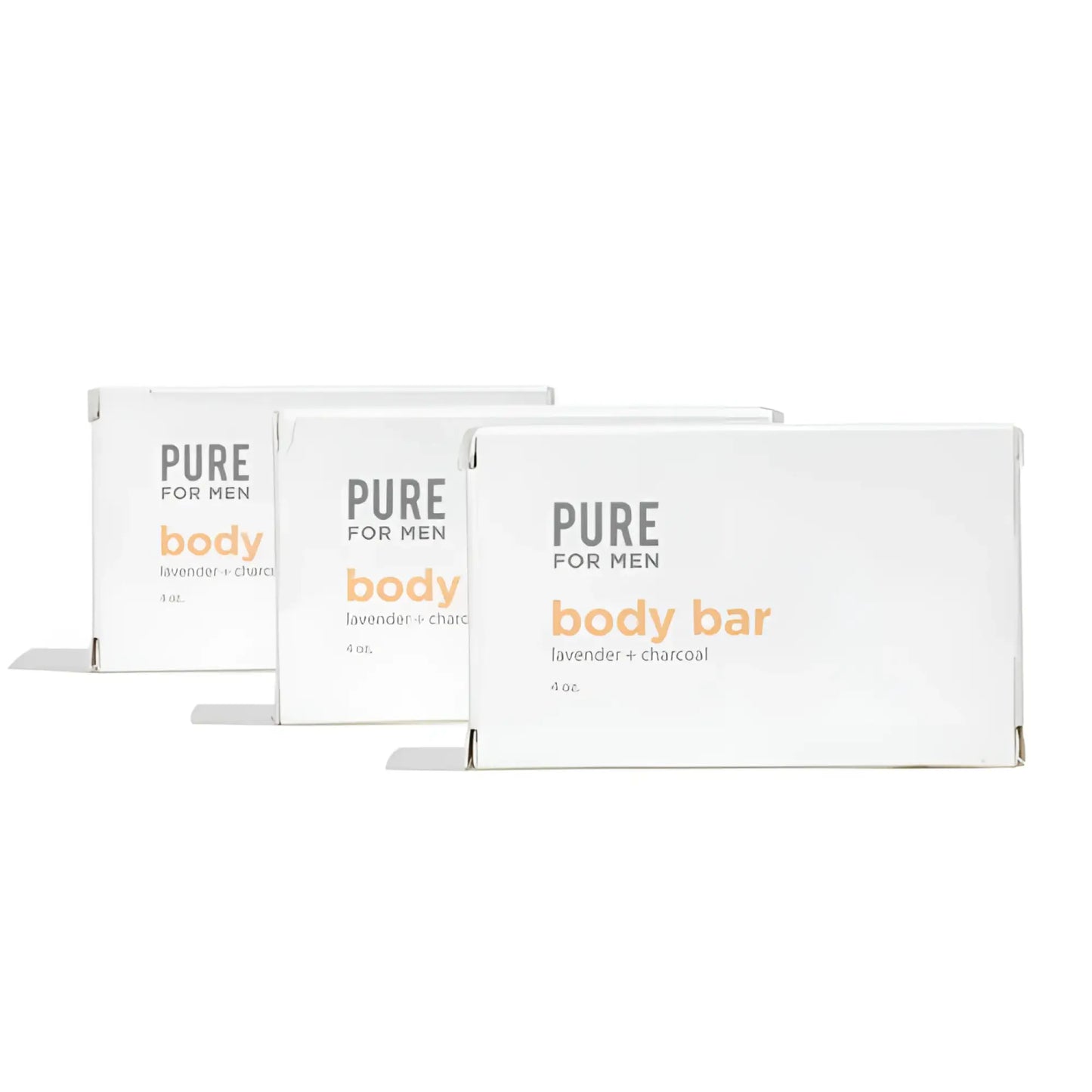 Three white rectangular boxes of pure for men lavender and charcoal body bar labeled stay ready bar in orange and gray text