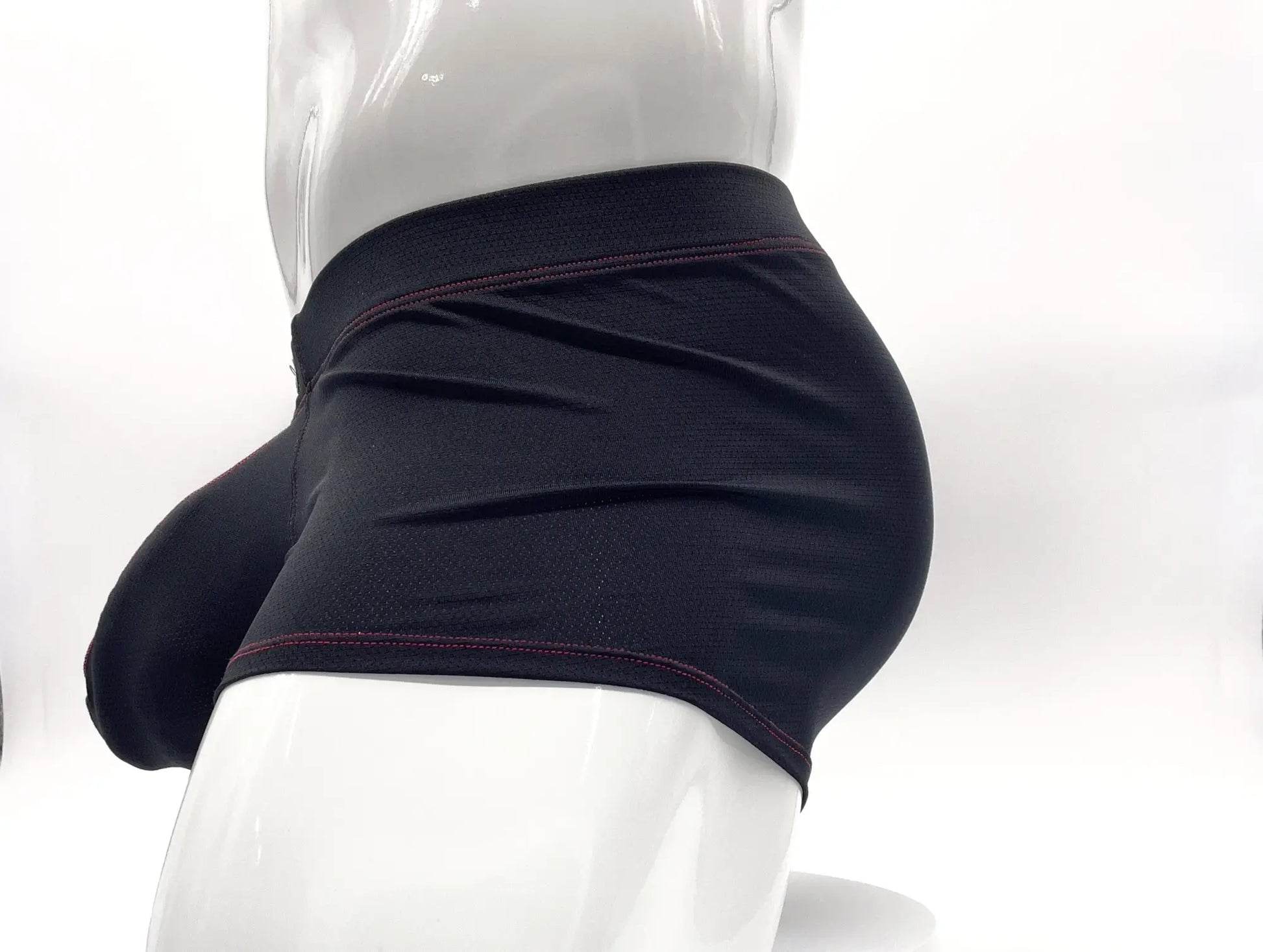 Black stitch big boy pouch boxer brief with snug fit and contrasting red stitching on the waistband