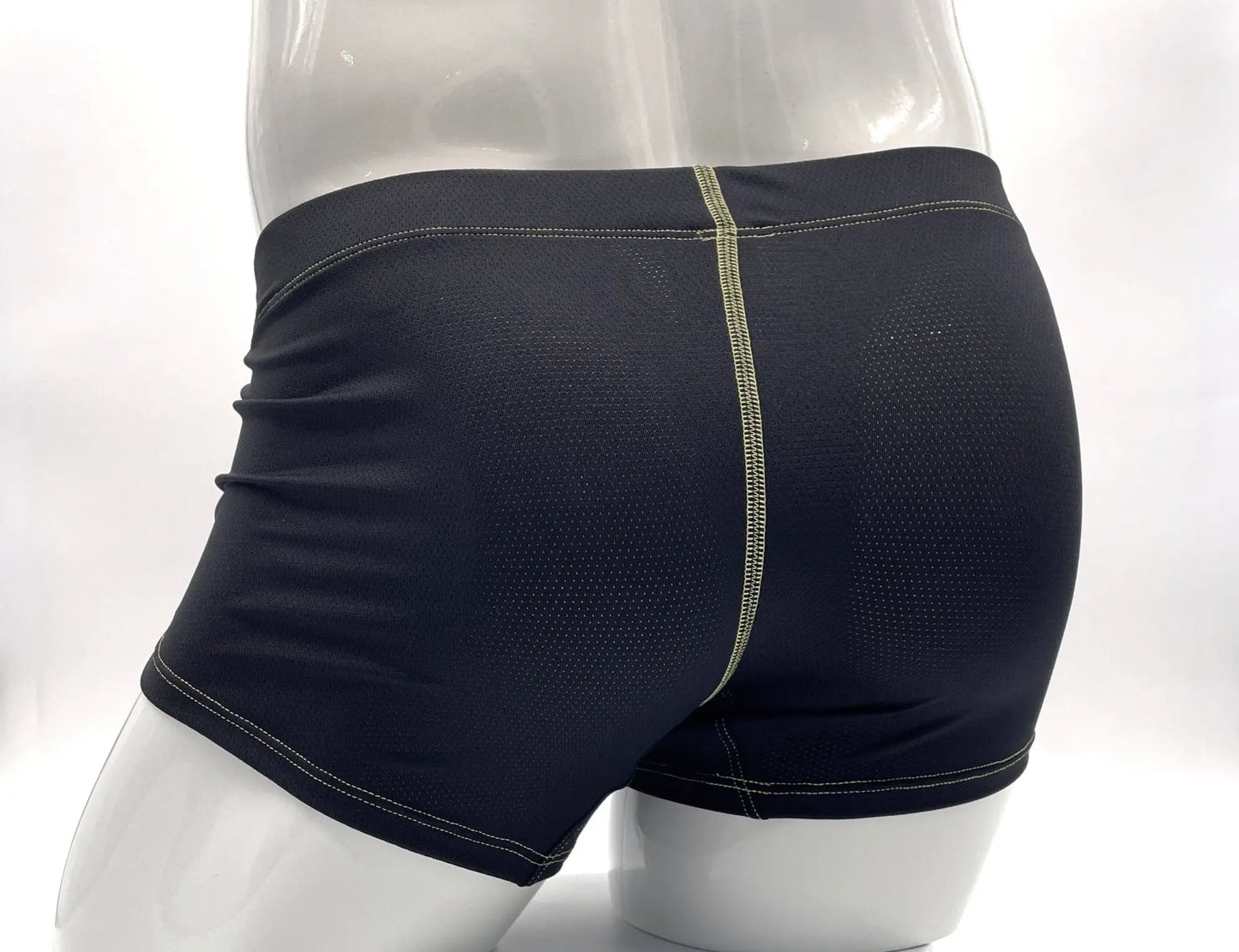 Black stitch big boy pouch boxer brief with mesh back panel and light green stitching along center seam