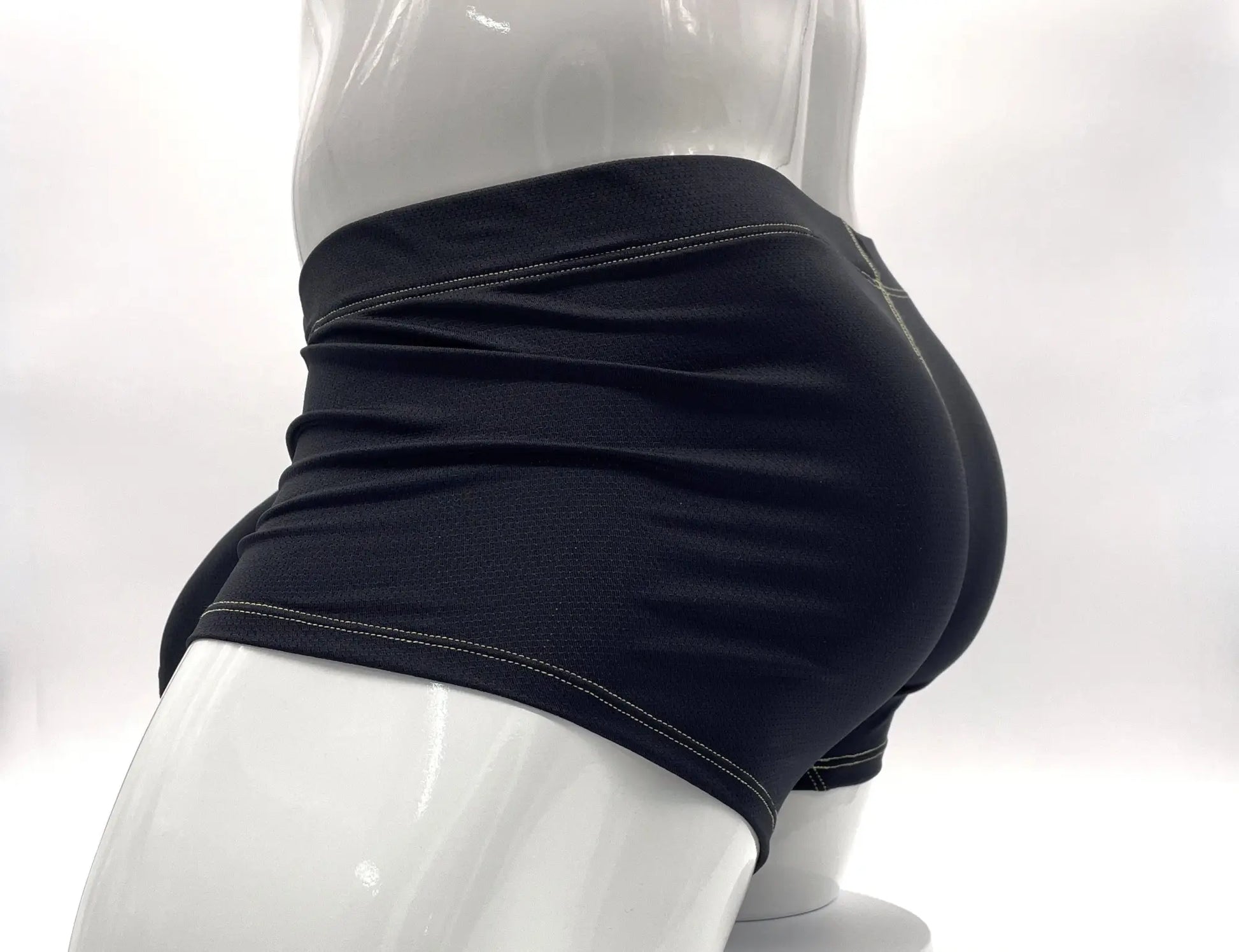 Stitched big boy pouch boxer brief in yellow with black athletic shorts featuring white stitching on waistband and hem
