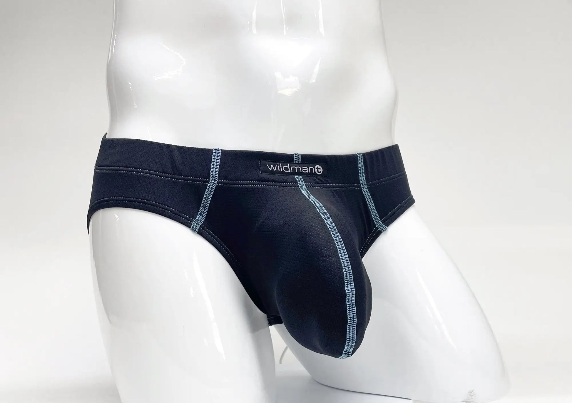Stitch big boy pouch brief in black by wildman with contrasting light gray stitching along the seams