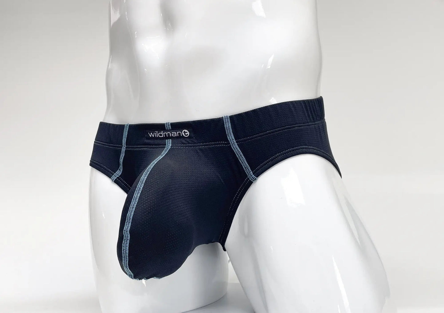 Dark navy blue stitch big boy pouch brief with light gray stitching and wildman waistband label for men
