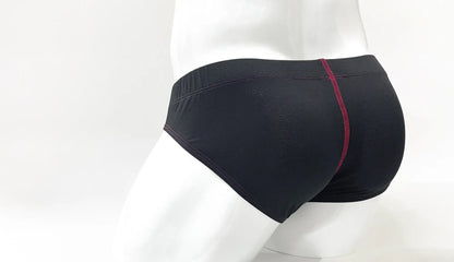 Black stitch big boy pouch brief with subtle textured pattern and contrasting red stitching on center seam